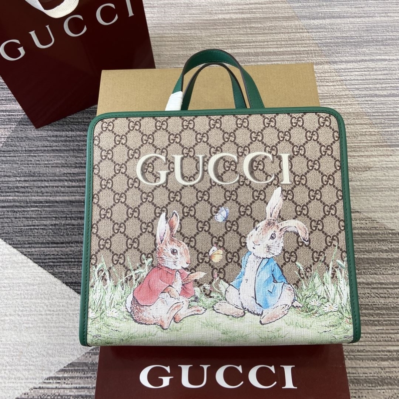 G*u*i shopping bags